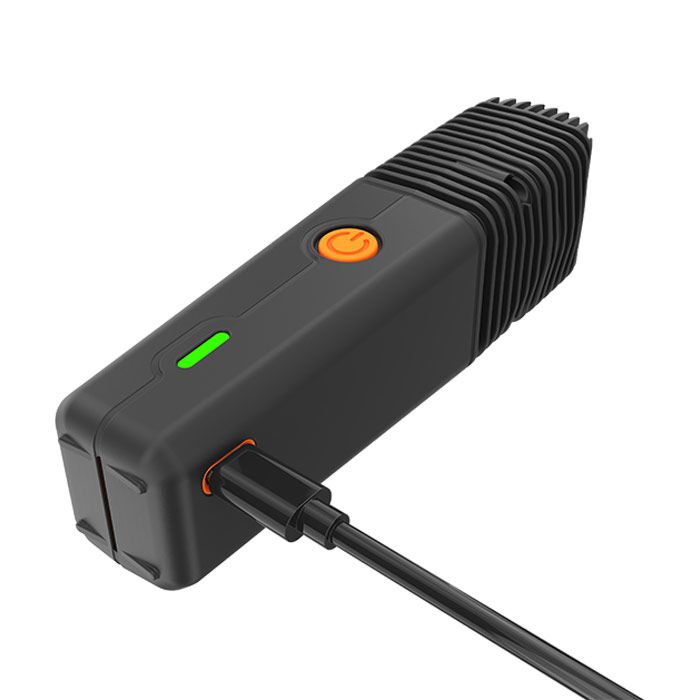 Veazy: Black electronic device with a cable on a white background
