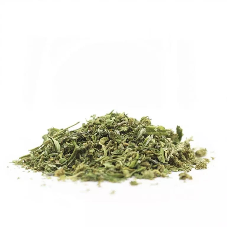 Dried green bud trim on a white background